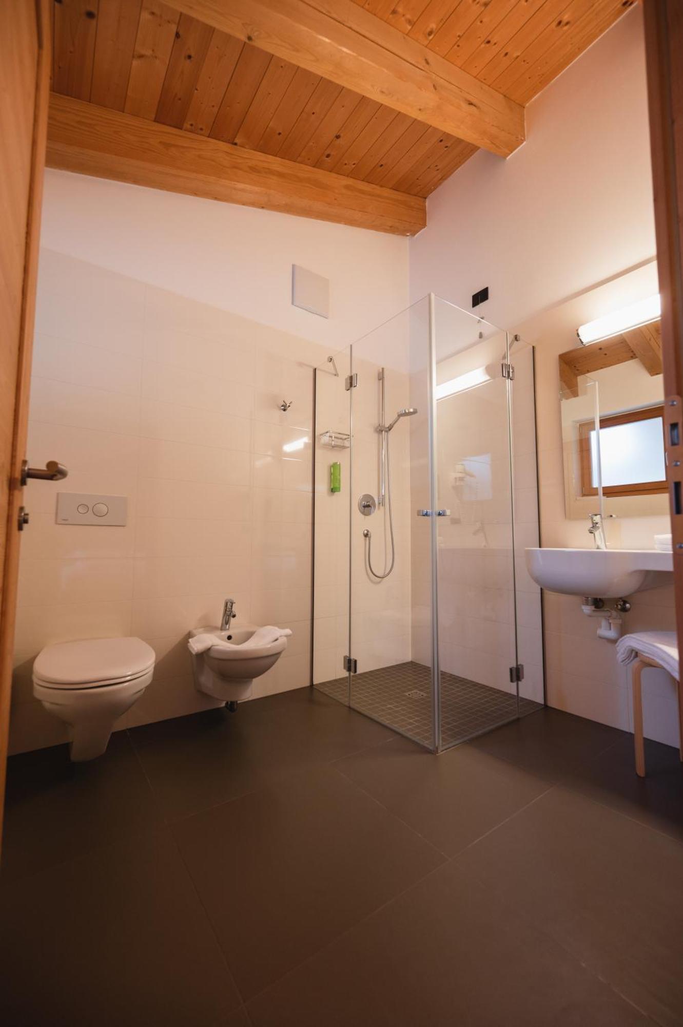 Hotel Garni Tuttotondo Levico Terme Habitación foto