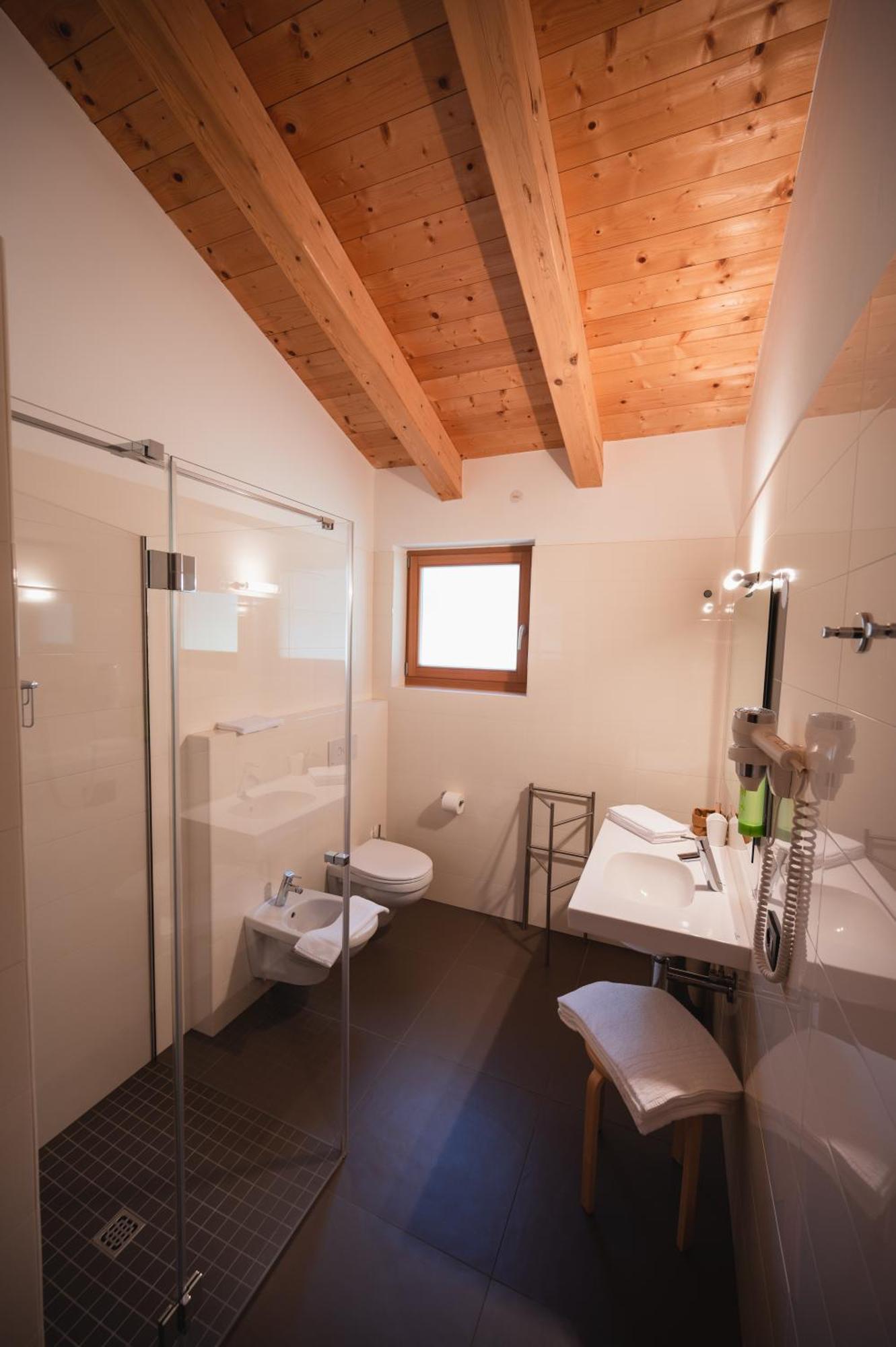 Hotel Garni Tuttotondo Levico Terme Habitación foto