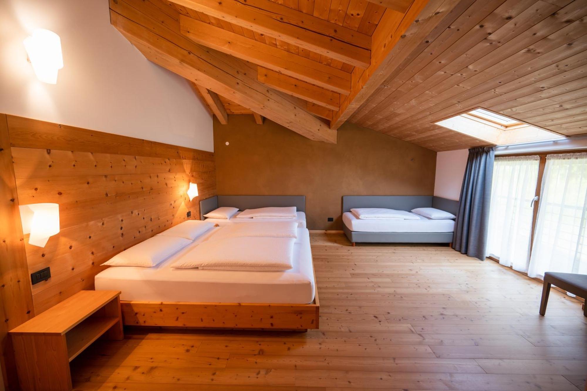 Hotel Garni Tuttotondo Levico Terme Habitación foto