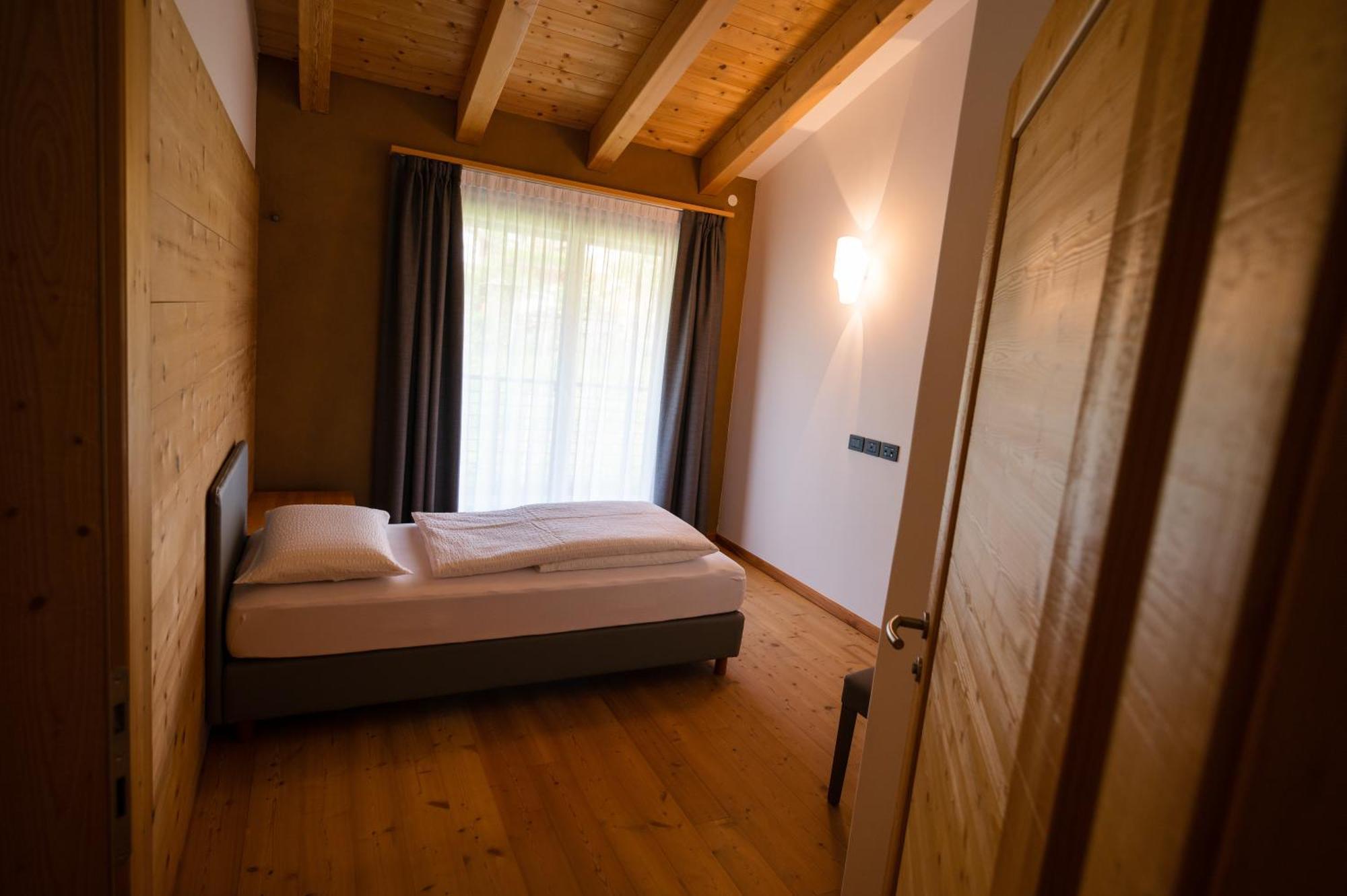 Hotel Garni Tuttotondo Levico Terme Habitación foto
